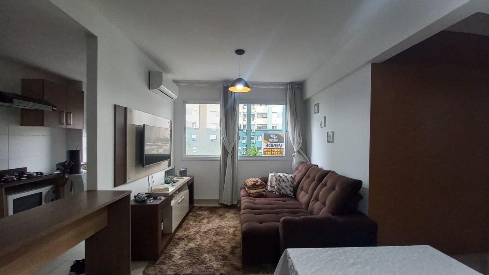 Apartamento mobiliado à venda no JK Parque Clube, Areal - com 54 m², 2 quartos (sendo 1 suíte), cozinha planejada e vaga.